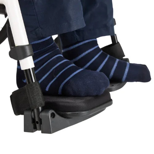 Pressure relief footrest pad on a wheelchair